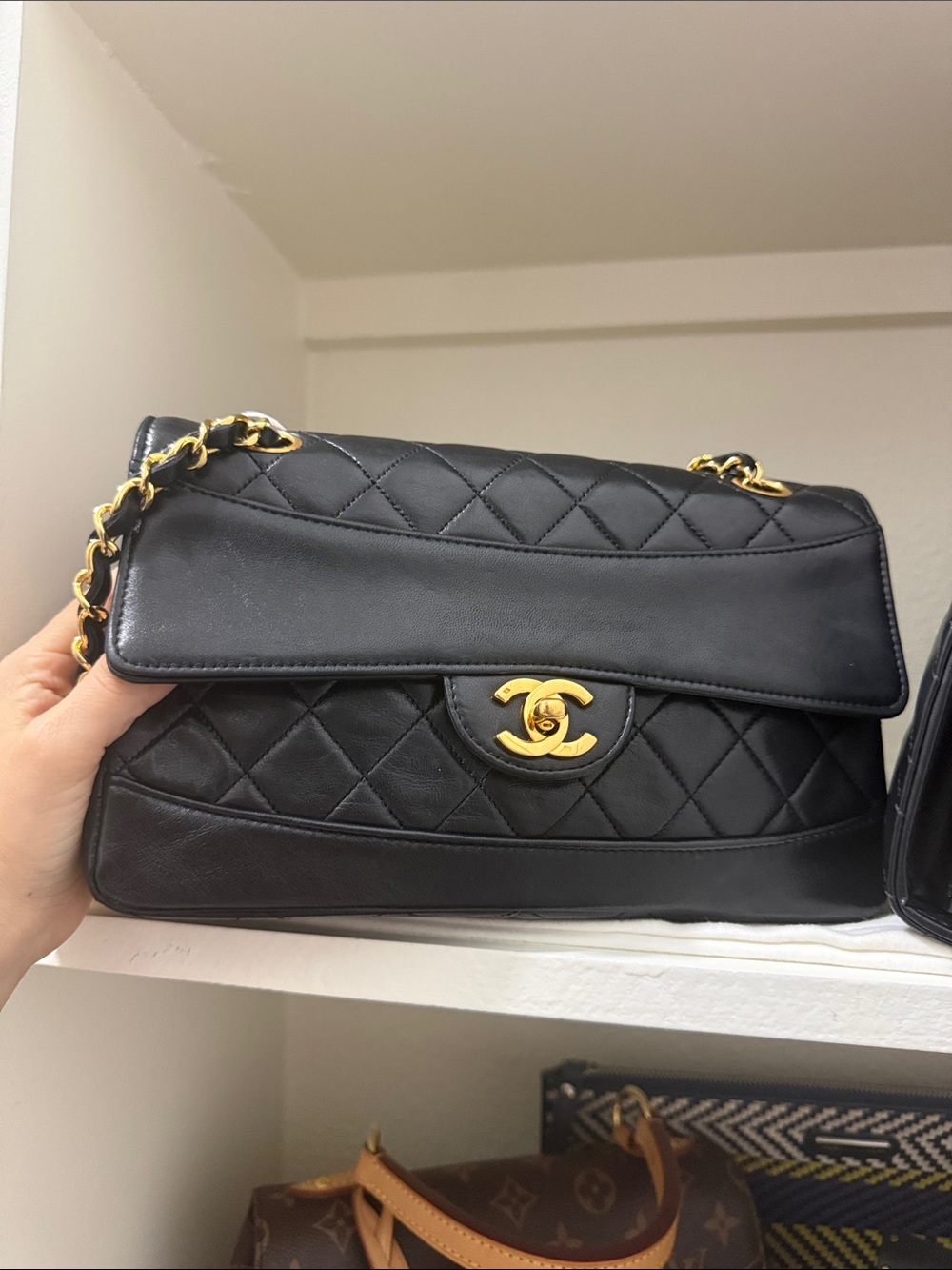Vintage Chanel Small Single Flap w/ Pouch
Black Lambskin 1989 24K GP